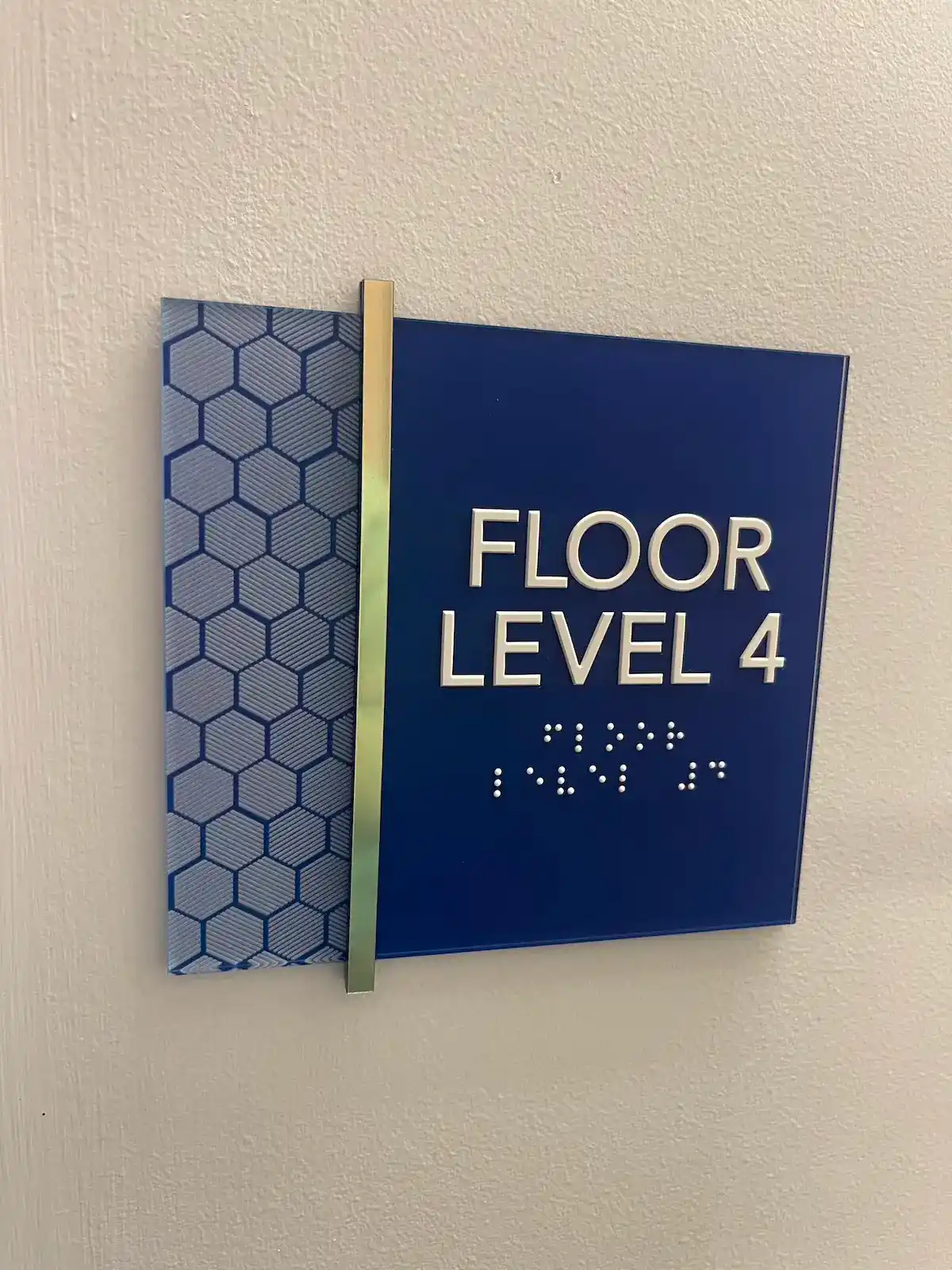 ADA compliance signage that says "Floor Level 4"