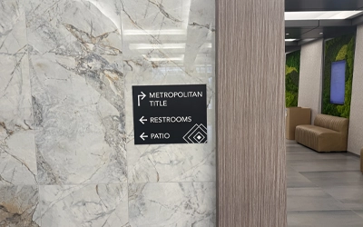 Interior directional sign panel